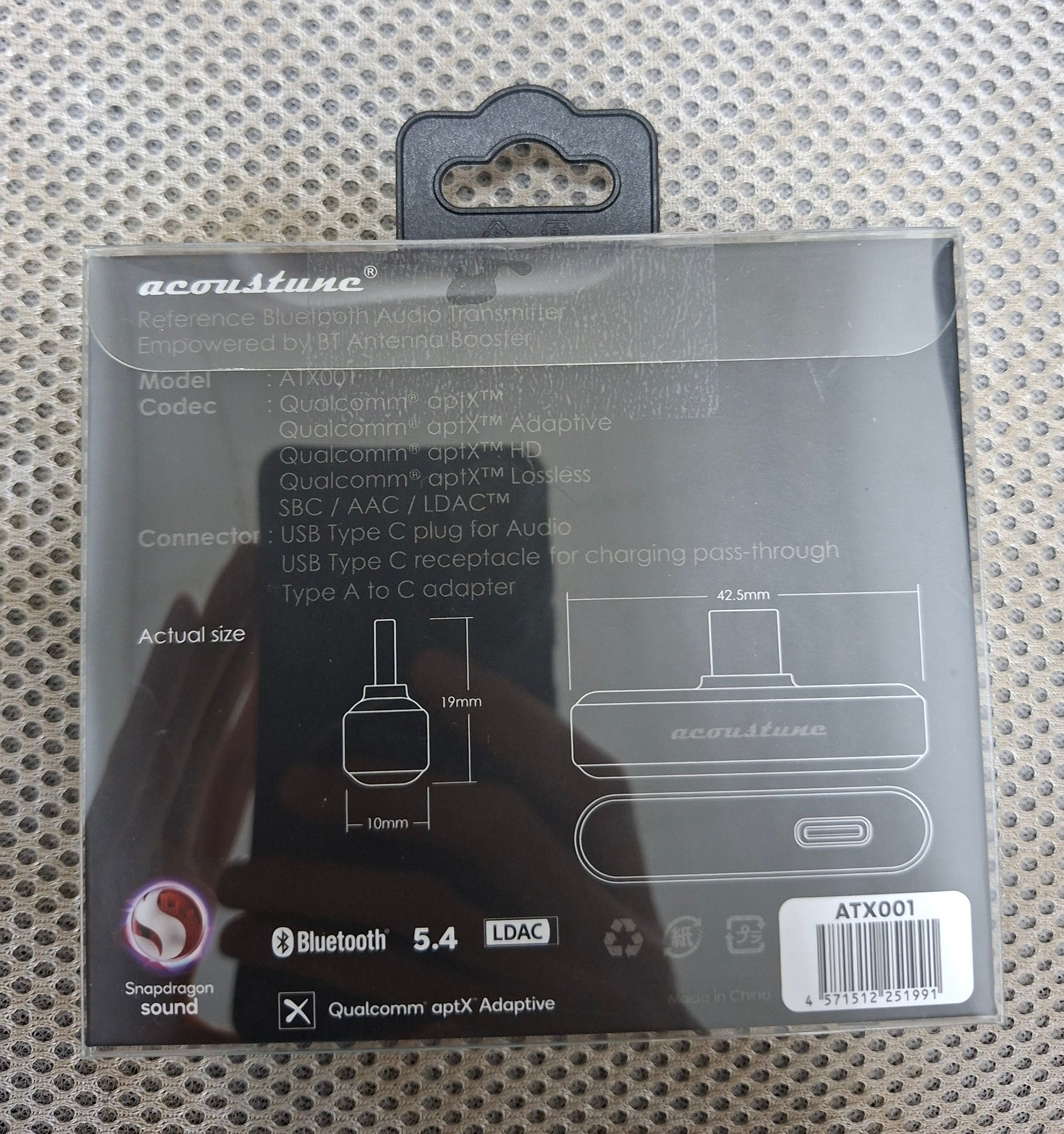 The Acoustune ATX001 Bluetooth transmitter set, including a premium USB-C to USB-A adapter for desktop compatibility